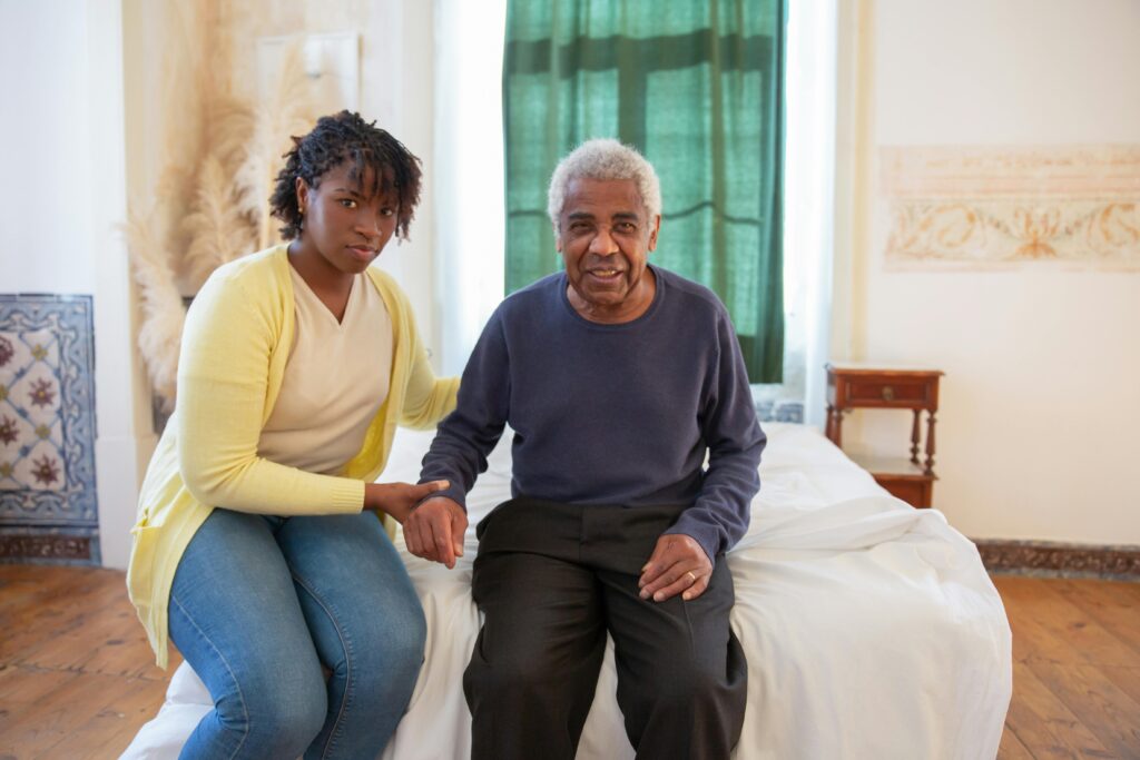 elderly home care caregiver smiling assistance