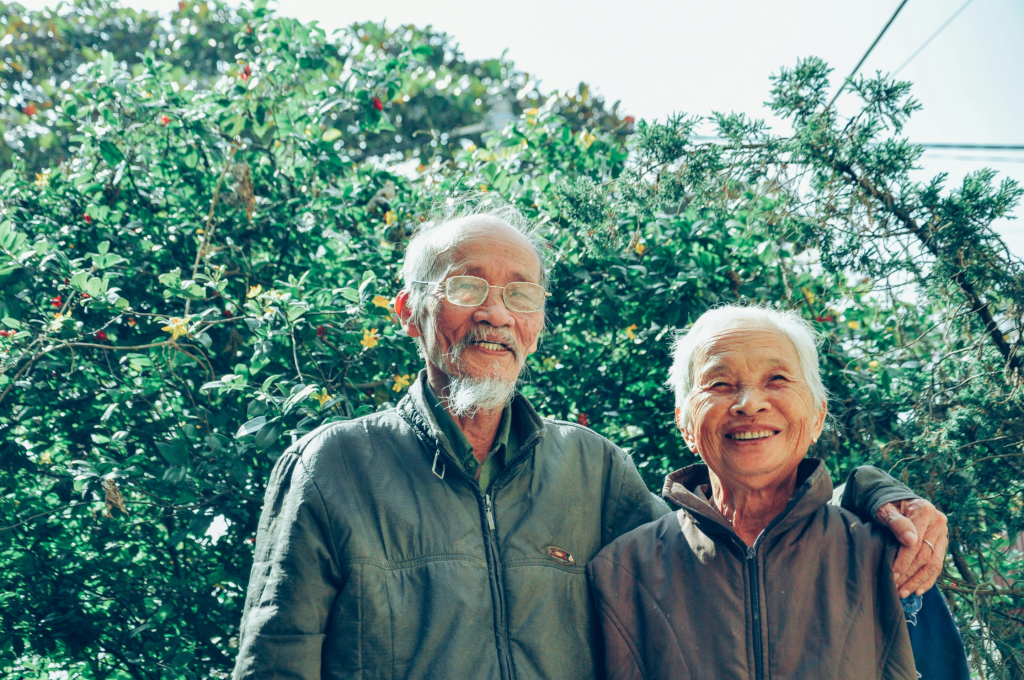 happy elderly couple sunny outdoor meeting